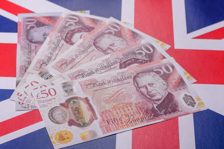 Britain paper money, pound sterling, cash banknotes for financial and business transactions. Britain...