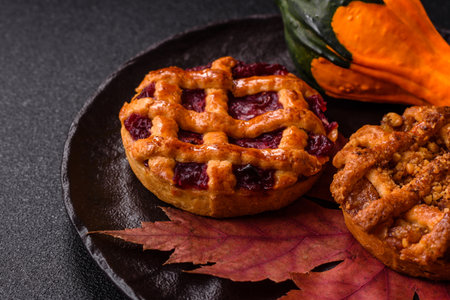 Cherry or strawberry sweet American Christmas pie or tart. American cherry pie as a food backdrop for your designの写真素材