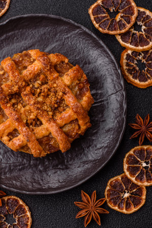 Apple or pumpkin pie or tart is a sweet American autumn treat. American apple pie as a food background for your designの写真素材