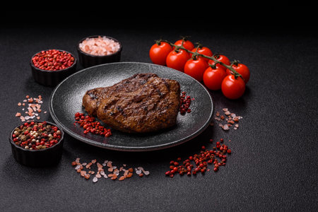 Food, grilled beef steak, roast meat for lunch. Grilled beef steak as a food background for your design.の写真素材