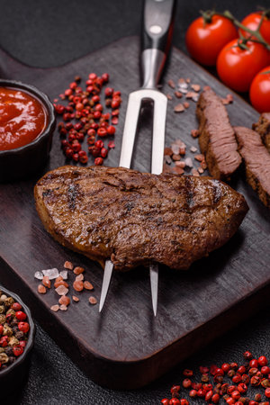 Food, grilled beef steak, roast meat for lunch. Grilled beef steak as a food background for your design.の写真素材