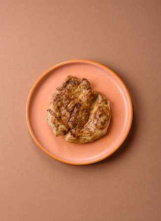 Food, grilled pork steak, roast meat for lunch. Grilled pork steak as a food background for your designの写真素材
