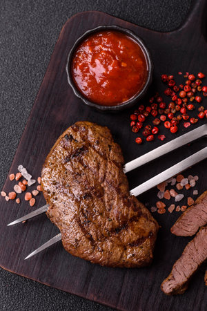 Food, grilled beef steak, roast meat for lunch. Grilled beef steak as a food background for your design.の写真素材