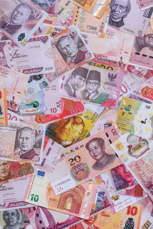 Money background, currency exchange, paper banknotes from different countries. Money cash currency as a financial background for your designの写真素材