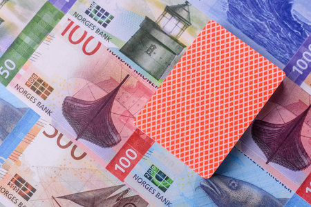 Casino game in the Norway, Norwegian krone money, chips, cards and other attributes. Gambling in...