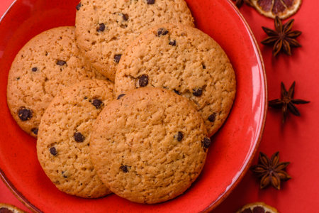 Food, oatmeal chocolate raisin cookies, dessert or breakfast pastry. Oatmeal chocolate cookies as a...