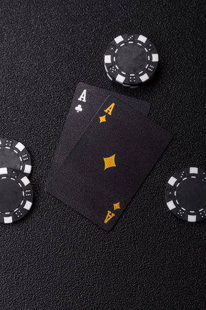 Playing blackjack or baccarat card game in casino with chips, bets and risk. Cards and chips on...