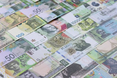 Money background, currency exchange, paper banknotes from different countries. Money cash currency as a financial background for your designの写真素材