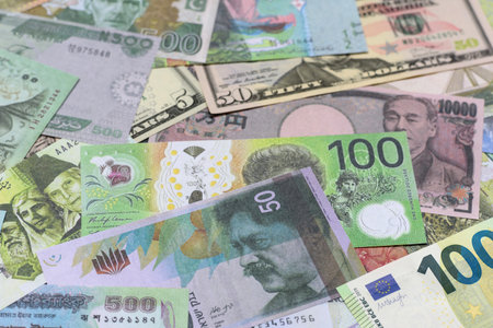 Money background, currency exchange, paper banknotes from different countries. Money cash currency as a financial background for your designの写真素材