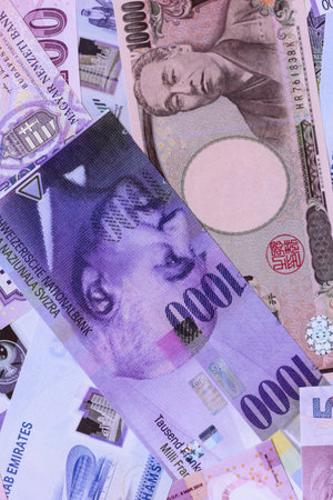 Money background, currency exchange, paper banknotes from different countries. Money cash currency as a financial background for your designの写真素材