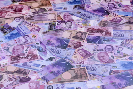 Money background, currency exchange, paper banknotes from different countries. Money cash currency as a financial background for your designの写真素材
