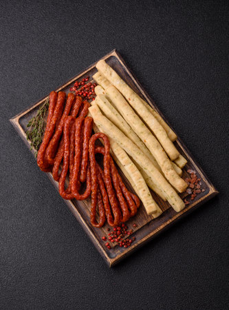 Grissini breadsticks, an Italian wheat pastry, are a great lunch snack. Grissini breadsticks as a...
