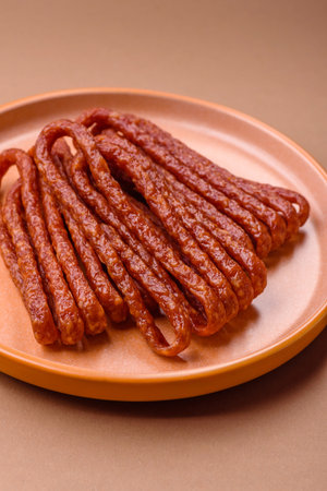 Smoked cabanossi, thin salami sausage, meat sticks, or snacks. Cabanossi sausage as a food...