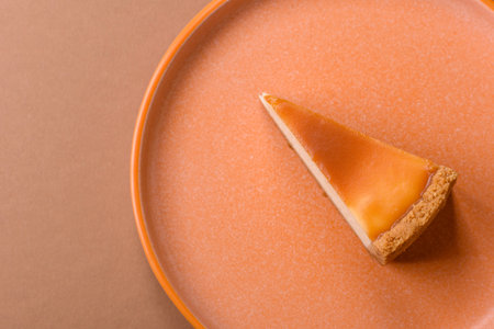 New York cheesecake, a slice of sweet pie, a classic cheesecake dessert. New York cheesecake as a food background for your designの写真素材