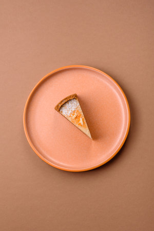 A slice of sweet pie, a classic cheese dessert. Cheesecake as a food background for your design