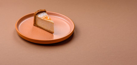 Cheesecake, a slice of sweet pie, a classic cheese dessert. Cheesecake as a food background for your...