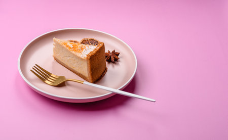 Cheesecake, a slice of sweet pie, a classic cheese dessert. Cheesecake as a food background for your designの写真素材