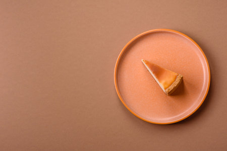 New York cheesecake, a slice of sweet pie, a classic cheesecake dessert. New York cheesecake as a food background for your designの写真素材