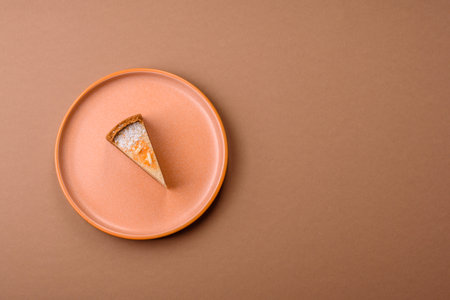 Cheesecake, a slice of sweet pie, a classic cheese dessert. Cheesecake as a food background for your designの写真素材