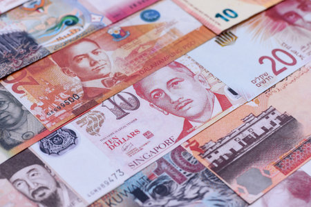 Money background, currency exchange, paper banknotes from different countries. Money cash currency as a financial background for your designの写真素材