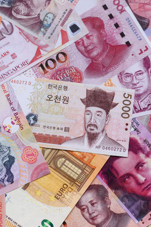 Money background, currency exchange, paper banknotes from different countries. Money cash currency as a financial background for your designの写真素材