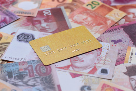 A credit card for contactless cashless payments via a terminal or online. A credit card for a financial backgroundの写真素材