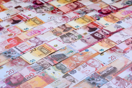 Money background, currency exchange, paper banknotes from different countries. Money cash currency as a financial background for your designの写真素材