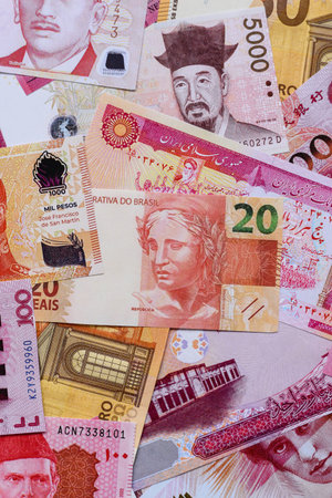 Money background, currency exchange, paper banknotes from different countries. Money cash currency as a financial background for your designの写真素材