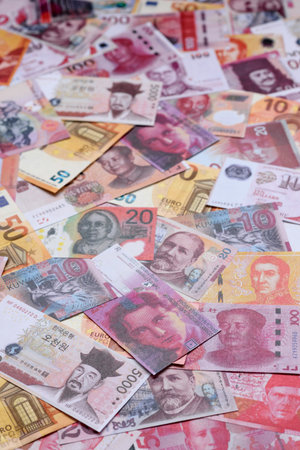 Money background, currency exchange, paper banknotes from different countries. Money cash currency as a financial background for your designの写真素材