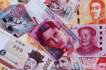 Money background, currency exchange, paper banknotes from different countries. Money cash currency as a financial background for your designの写真素材