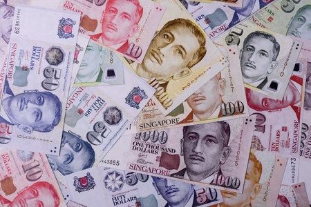 Money, currency of Singapore, dollar banknotes of various denominations. Singapore money as a...