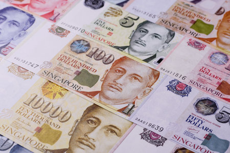 Money, currency of Singapore, dollar banknotes of various denominations. Singapore money as a...