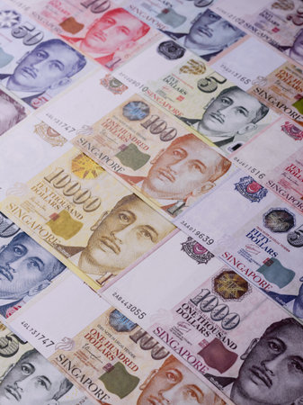 Money, currency of Singapore, dollar banknotes of various denominations. Singapore money as a...