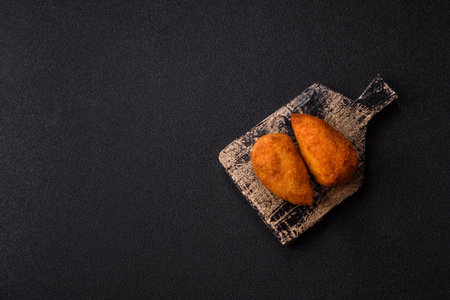 Chicken Kyiv cutlet with buttery filling, a lunch of chicken breast meat. Chicken Kyiv cutlet as a food background for your designの写真素材