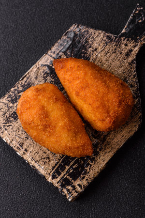 Chicken Kyiv cutlet with buttery filling, a lunch of chicken breast meat. Chicken Kyiv cutlet as a food background for your designの写真素材