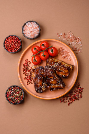 Grilled or bbq pork ribs with sauce, a food prepared for dinner. Grilled ribs as a food background for your designの写真素材