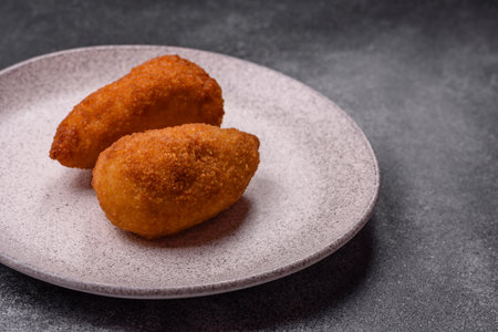 Chicken Kyiv cutlet with buttery filling, a lunch of chicken breast meat. Chicken Kyiv cutlet as a...