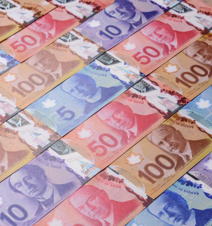 Money, currency of Canada, dollar banknotes of various denominations. Canadian money as a financial...