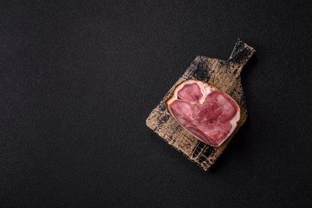 A meat roll made from pork or beef tongue slices with spices. Tongue roll as a background for your...