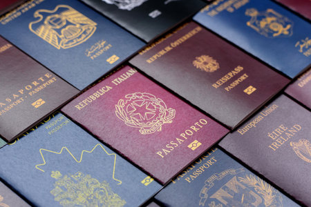 Passports of citizens of different countries of the world, background consisting of passports of several countriesの写真素材