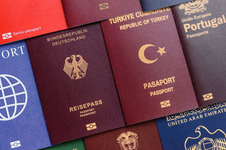 Passports of citizens of different countries of the world, background consisting of passports of several countriesの写真素材