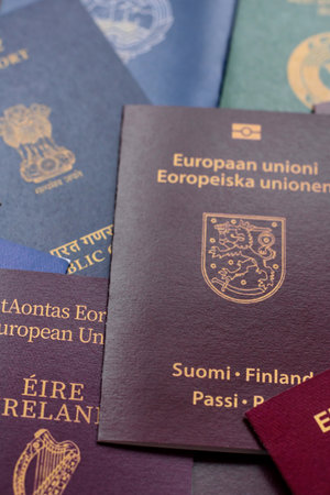 Passports of citizens of different countries of the world, background consisting of passports of several countriesの写真素材