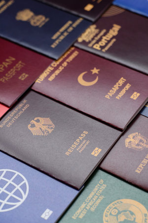 Passports of citizens of different countries of the world, background consisting of passports of several countriesの写真素材