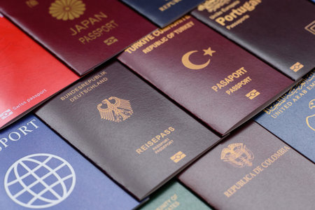 Passports of citizens of different countries of the world, background consisting of passports of several countriesの写真素材