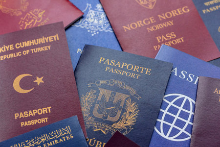 Passports of citizens of different countries of the world, background consisting of passports of several countriesの写真素材