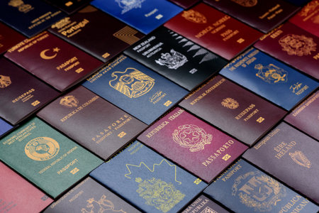 Passports of citizens of different countries of the world, background consisting of passports of several countriesの写真素材