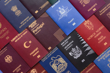 Passports of citizens of different countries of the world, background consisting of passports of several countriesの写真素材