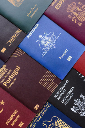 Passports of citizens of different countries of the world, background consisting of passports of several countriesの写真素材