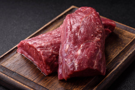 Raw meat, fresh beef tenderloin or filet mignon for grilling. Raw beef tenderloin as a food background for your designの写真素材