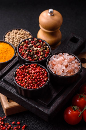 Indian spices, pepper, salt, turmeric, ingredients for cooking. Spices pepper, salt, and turmeric as a food background for your designの写真素材